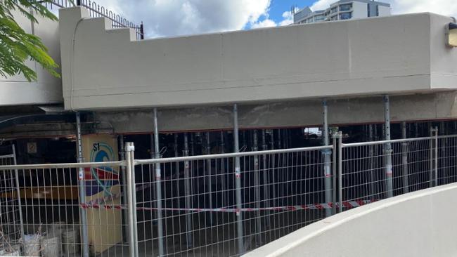 Fencing showing repair works underway on one level of the Bruce Bishop car park in Surfers Paradise.