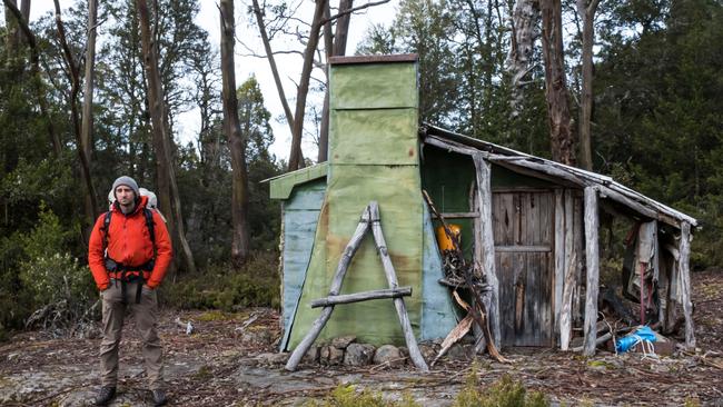 Walker and trout fisher Richard Webb outside the historic hut on Halls Island on Lake Malbena in the Walls of Jerusalem NP and Tamsmania's World Heritage Area, where an exclusive fly fishing eco resort has been proposed for the island by Wild Drake. Webb and others may not be able to visit the island in the future if the proponent's exclusive use of the island is approved.