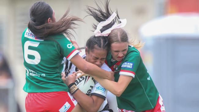 Afeena Faamafu is sandwich tackled by Wynnum-Manly’s plucky defenders last weekend.