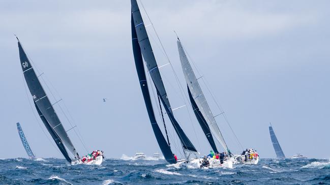 Yachts on their way to Hobart after the start of the race.