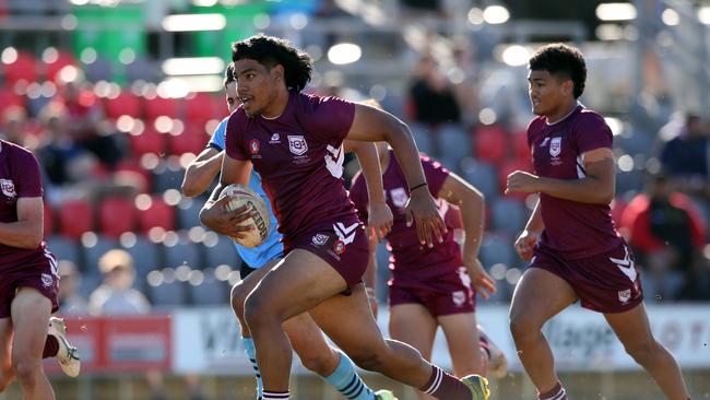 QLD's Elekana Suavai makes a break. Picture: Zak Simmonds