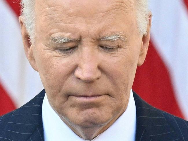 TOPSHOT - US President Joe Biden addresses the nation from the Rose Garden of the White House in Washington, DC, November 7, 2024, after Donald Trump wins presidential election. Biden urged Americans Thursday to lower the political temperature after Donald Trump's sweeping election win, saying he would ensure a 