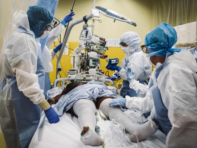 Medical staff take care a COVID-19 patient at the intensive care unit of the Franco-Britannique hospital in Levallois-Perret, northern Paris. Picture: AFP