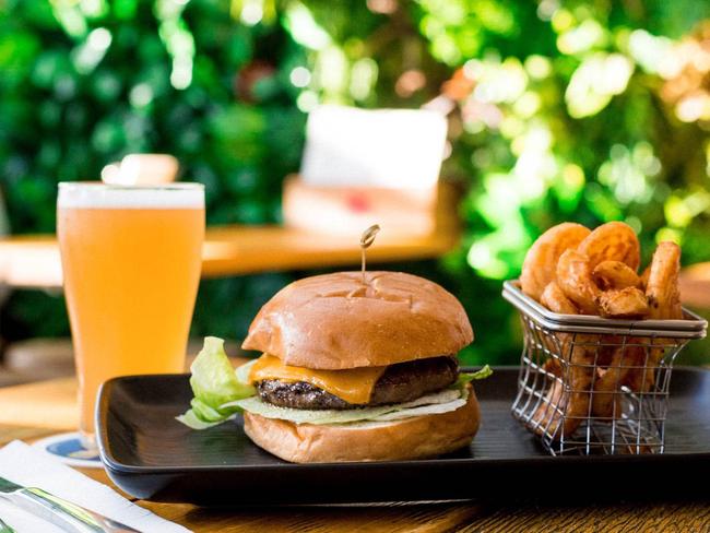 The DeLuxe Burger, wedges and beer at Beer Deluxe. Picture: Supplied