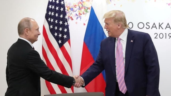 Russia’s President Vladimir Putin shakes hands with former US president Donald Trump during a meeting on the sidelines of the G-20 summit in Osaka, Japan, in 2019. Picture: Sputnik/Reuters/WSJ