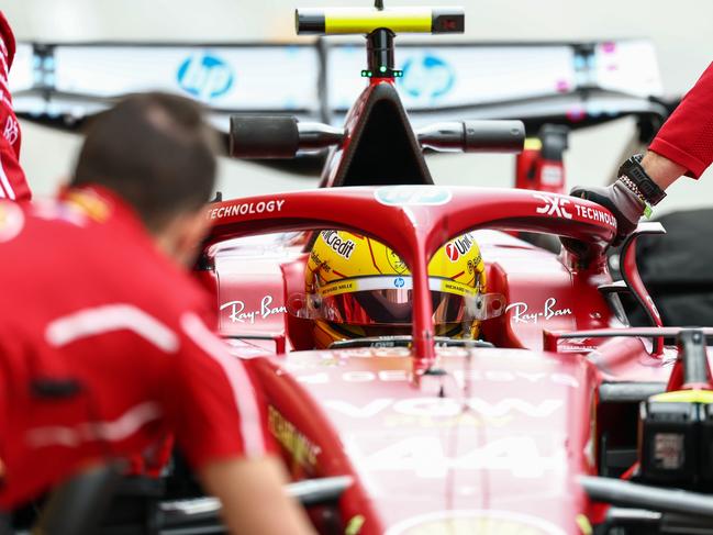 BAHRAIN, BAHRAIN - FEBRUARY 26: Lewis Hamilton of Great Britain driving the (44) Scuderia Ferrari SF-25 makes a pitstop during day one of F1 Testing at Bahrain International Circuit on February 26, 2025 in Bahrain, Bahrain. (Photo by Clive Rose/Getty Images)