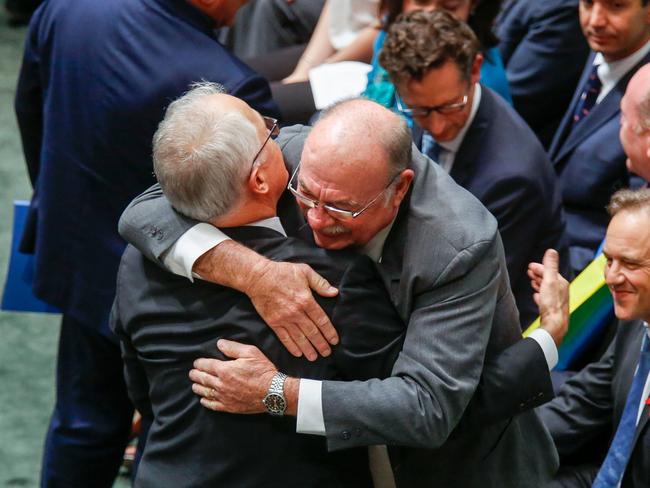 Warren Entsch  hugs  Malcolm Turnbull  after the Parliament passed the same-sex marriage bill.