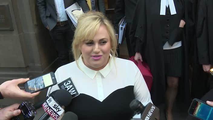 Rebel Wilson speaks to media after day on witness stand