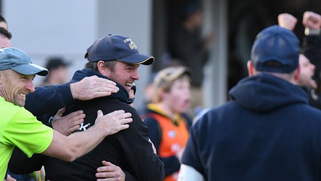 Whittlesea coach Jim Atkins' smile on the final siren as his team snaps an 11-game losing streak by beating Montmorency. Picture: Nathan McNeill.