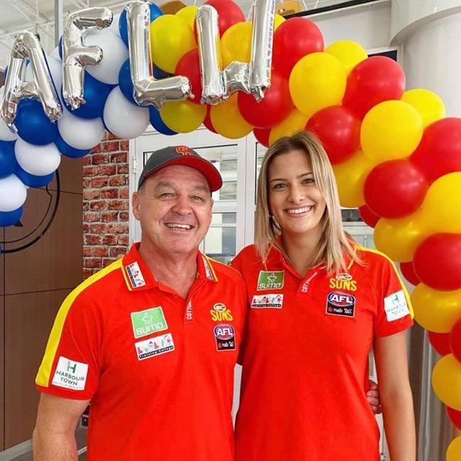 David Lake and Lauren Bella arrive in Mackay for the Suns match against Geelong. SUPPLIED