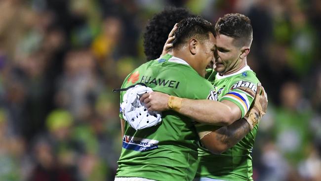 Josh Papalii of the Raiders (left) and Jarrod Croker of the Raiders celebrate after scoring a try during the NRL Preliminary Final match between the Canberra Raiders and South Sydney Rabbitohs at GIO Stadium in Canberra, Friday, September 27, 2019. (AAP Image/Lukas Coch) NO ARCHIVING, EDITORIAL USE ONLY