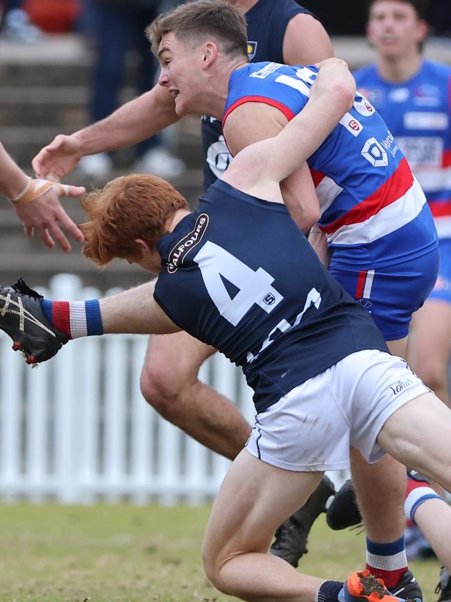 Star Central District midfielder Harry Grant gets his kick away under pressure from South Adelaide’s Joseph Haines at Elizabeth Oval. Picture: David Mariuz/SANFL