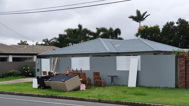 Furniture out front of a home on Poinsettia Ave at Hollywell. Picture: Luke Mortimer