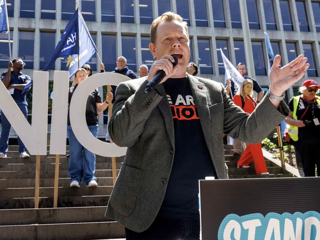 Trades Hall Secretary Luke Hilakari speaks at the rally. Picture: David Geraghty