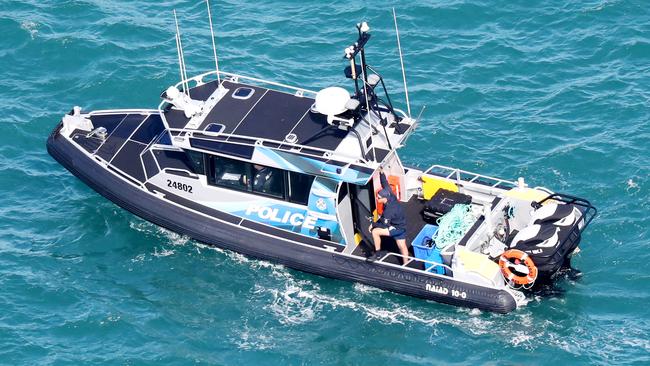 A police boat taking part in the search operation today. Picture: Nigel Hallett