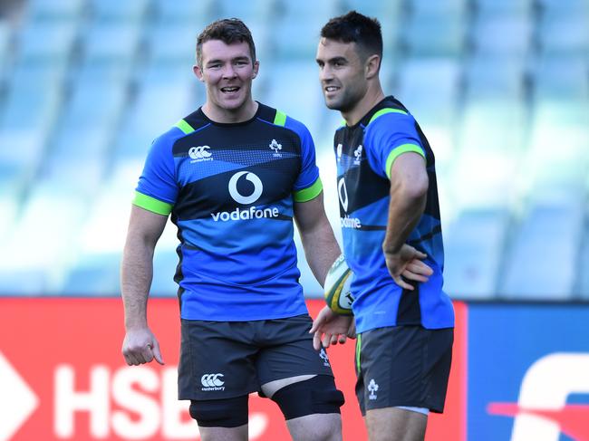 Peter O'Mahony (left) stands next to Conor Murray during their Captains Run rugby training session at the Allianz Stadium in Sydney, Friday, June 22, 2018. Ireland take on the Australia 'Wallabies' on Saturday night in Sydney in the final match of the Ireland Series. (AAP Image/David Moir) NO ARCHIVING