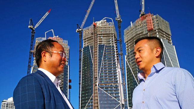 Exile Xiangmo Huang and his son Jimmy Huang at the construction site for Jewel in 2019. Photo: Supplied