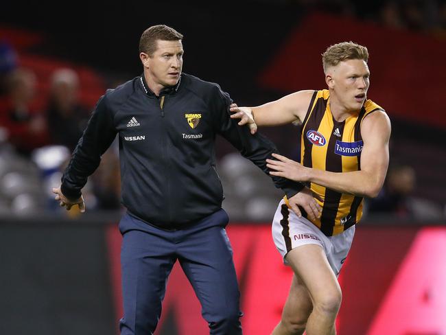 Hawthorn assistant coach Scott Burns (left) has emerged as a leading contender for the vacant Crows senior coaching position. Picture: Michael Klein