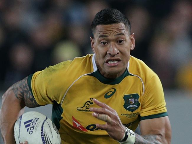 Australia`s Israel Folau makes a run to score a try against New Zealand in the International Rugby Test Match at Eden Park in Auckland, New Zealand on Friday, April 10, 2015. (AAP Image/ David Rowland) NO ARCHIVING, EDITORIAL USE ONLY