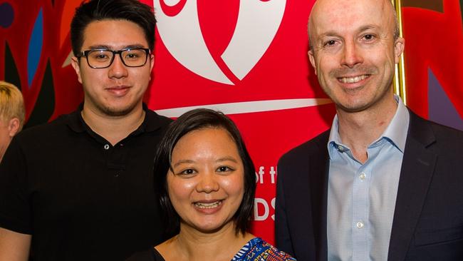 Duncan Cambridge, right, of Pennant Hills, and VMware team Brian Li and Kelly Xiao after winning the volunteer of the Year award in the Corporate Volunteer Team category.: