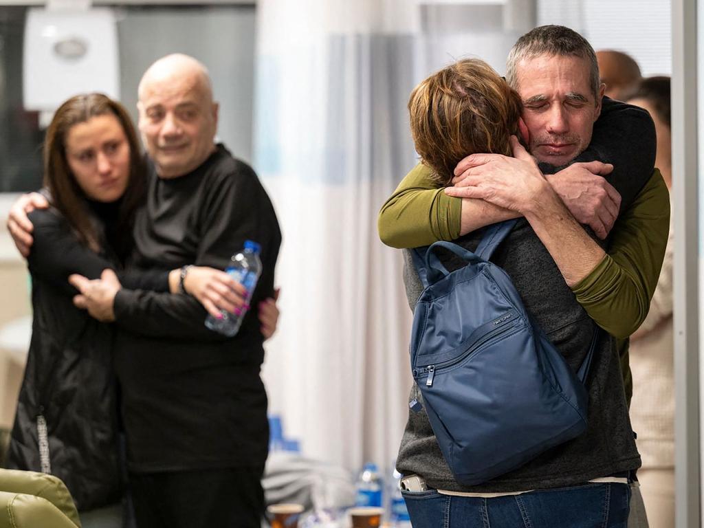 Rescued Israeli-Argentinian hostage Fernando Simon Marman (R) being reunited with his family at the Tel Hashomer Hospital in Ramat Gan, on the outskirts of Tel Aviv. Picture: AFP