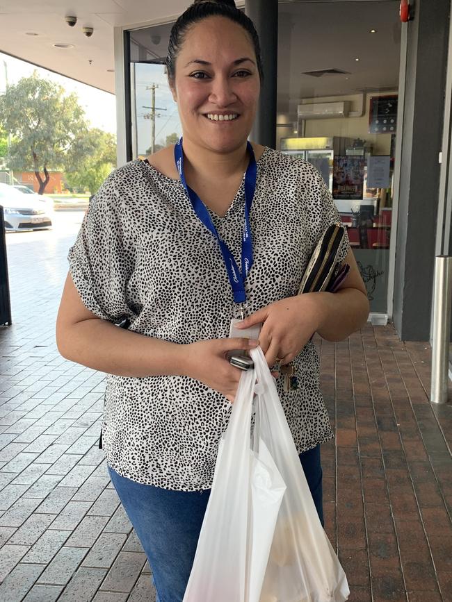 Tumau Pesaleli supports the bag ban, despite being given a single-use plastic bag at a grocer.