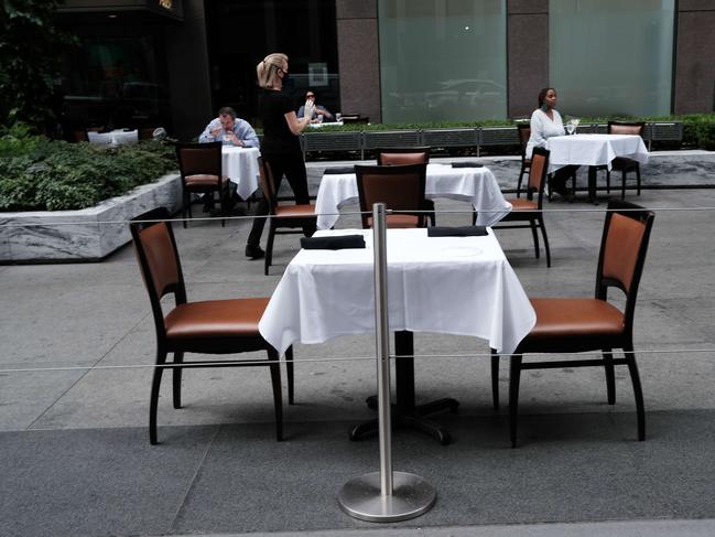 A table stands empty at a restaurant in Manhattan. Picture: AFP