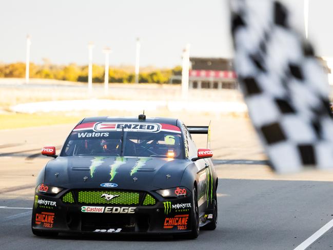 TAILEM BEND, AUSTRALIA - MAY 09: (EDITORS NOTE: A polarizing filter was used for this image.) Cameron Waters drives the #6 Monster Energy Ford Mustang takes the chequered flag to win race 3 of the OTR Supersprint which is part of the 2021 Supercars Championship, at The Bend Motorsport Park on May 09, 2021 in Tailem Bend, Australia. (Photo by Daniel Kalisz/Getty Images)