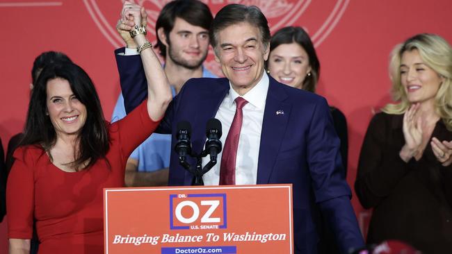 Republican Senate candidate Mehmet Oz celebrates with his wife Lisa during an election night event – before he lost the election. Picture: AFP.