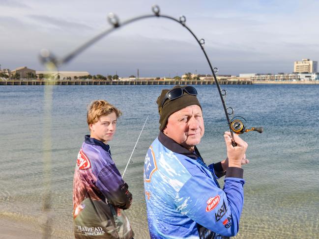 Recreational fisherman Tim Johnson and son Ryan fishing at the Port river, Sunday, June 14, 2020. Recreational fishers could have to carry a licence with them under a plan by the Ministers Recreational Fishing Advisory Council. (Pic: Brenton Edwards)