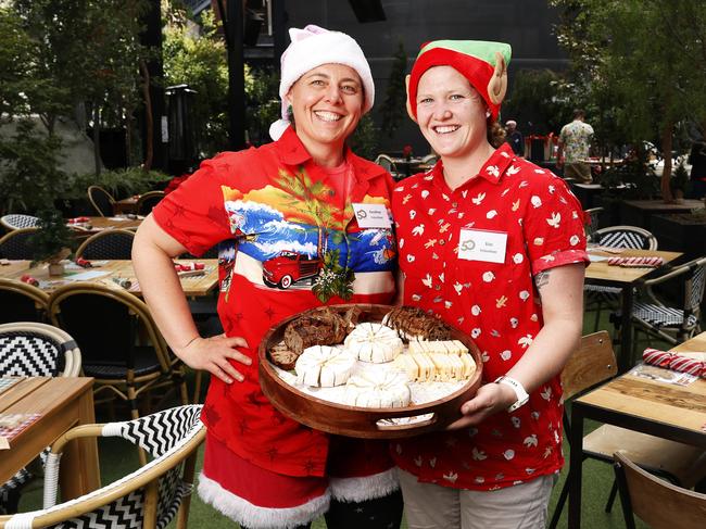 Volunteers Heather Davis-Schnierer with partner Erin Davis-Schnierer.  Colony47 Christmas Day lunch at In The Hanging Garden.  Picture: Nikki Davis-Jones