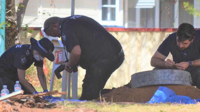 Police photograph findings at a Chinchilla property. Picture: Peta McEachern