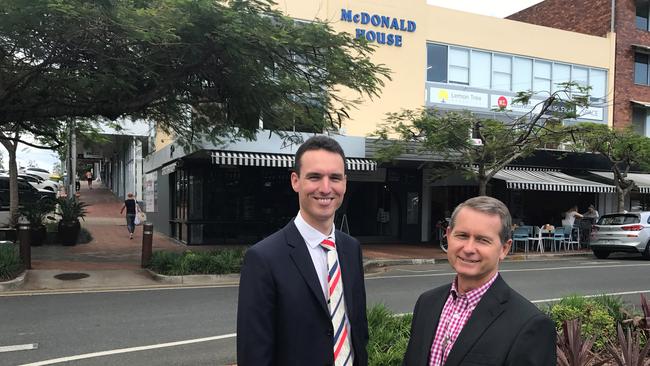 LANDMARK DEAL: James Crawford and Darrell Irwin of Colliers International outside McDonald House at Burleigh Heads, which has sold post-auction for $8.3 million.