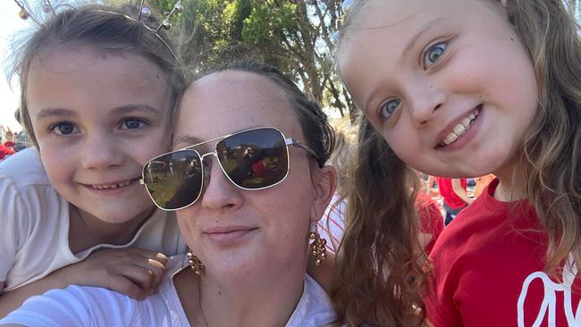 Ms Nouwland with two of her daughters.