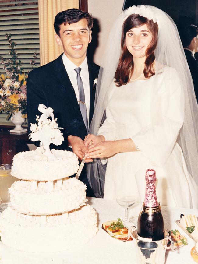 Vili and Rosemary Milisits with a different kind of baked goods, on their wedding day.