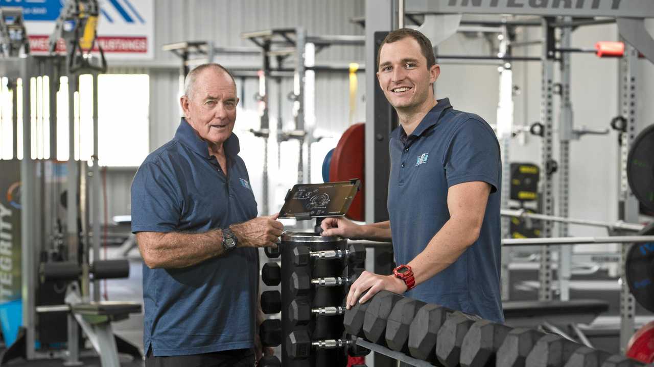 HIGH PERFORMANCE: Technology plays a key role in measuring and developing athletic development, according to The Fit Lab high performance coach Steve Nance (left) and fitness manager and high performance coach Corey Wolsk. Picture: Kevin Farmer