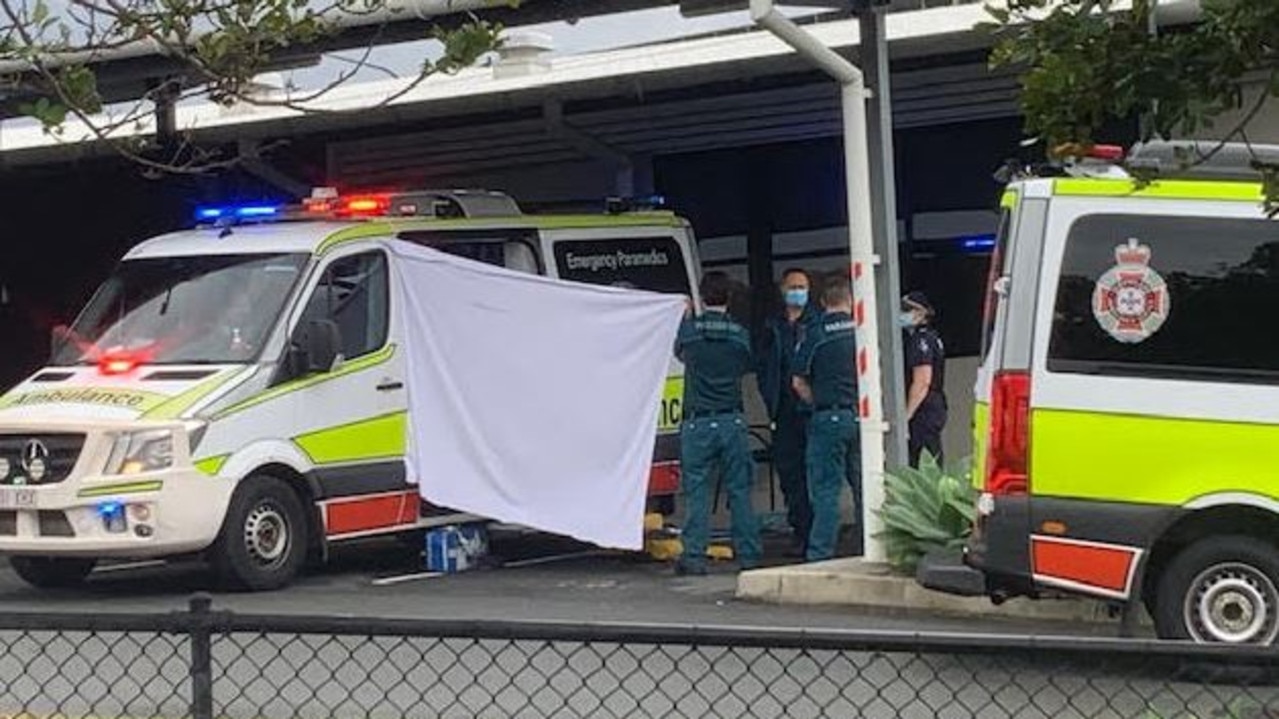 Paramedics at the Robina Police Station, where the couple were taken after the explosion. Picture: Greg Stolz