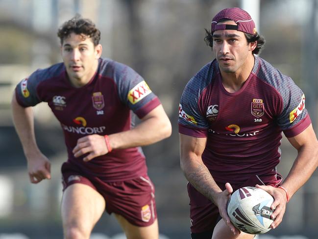 Billy Slater and Johnathan Thurston. The Queensland State of Origin side training at Punt Road Oval in Melbourne. Pic Peter Wallis