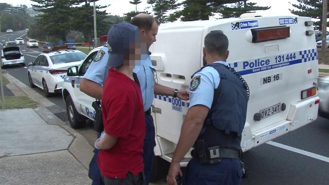 A teen is taken into custody after a brawl erupted at Newport earlier this year. Picture: TNV