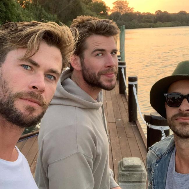 Chris (left) and Liam Hemsworth enjoy some quality time together.