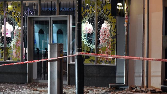 Glass and masonry on the footpath in Wakefield Street, Wellington after a 7.5 earthquake based around Cheviot in the South island shock the capital, New Zealand, Monday, November 14, 2016. (AAP Image/SNPA, Ross Setford) NO ARCHIVING, EDITORIAL USE ONLY