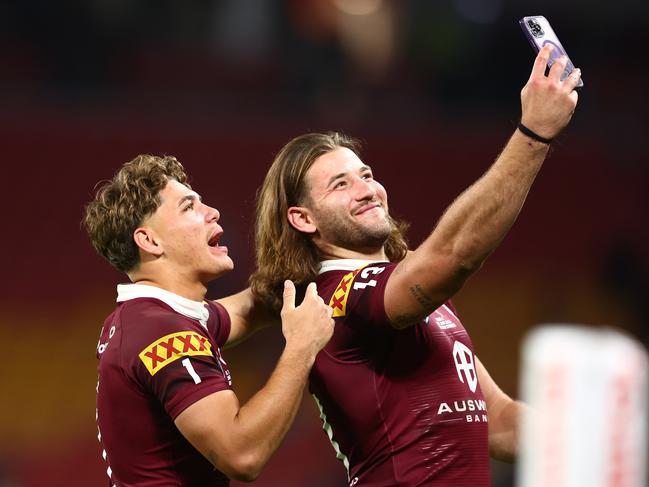 BRISBANE, AUSTRALIA - JUNE 21:  Reece Walsh and Patrick Carrigan of the Maroons take a selfie after winning game two of the State of Origin series between the Queensland Maroons and the New South Wales Blues at Suncorp Stadium on June 21, 2023 in Brisbane, Australia. (Photo by Chris Hyde/Getty Images)