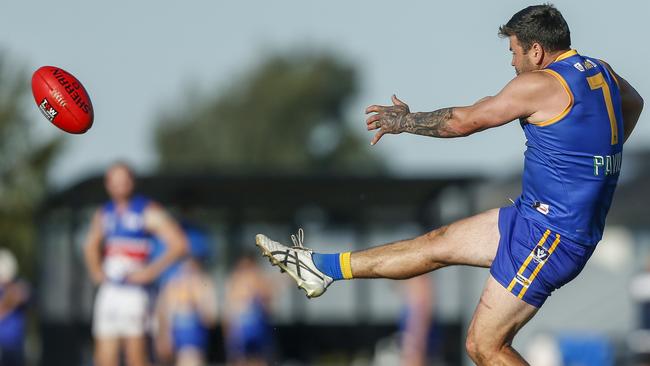 Champion forward Marc Holt takes a kick for Cranbourne this year. Picture: Valeriu Campan