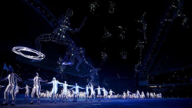 Rollerskaters perform during the opening ceremony.