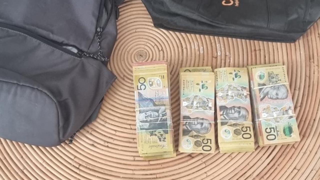 Cash seized from the W Hotel in Brisbane. Picture: AFP