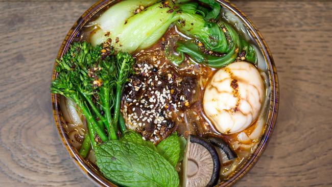 Naxi Folk’s breakfast noodles with beef brisket, mushrooms, fresh herbs. Picture: Sarah Matray