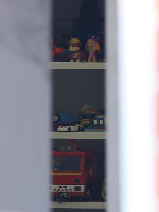 A toy shelf inside the Cabramatta house. Picture: David Swift