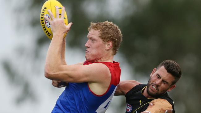 Declan Keilty reels in a contested mark during the JLT Series. Picture: Michael Klein