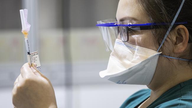 If every spectator at an MCG grand final was vaccinated and wearing masks, the risk of spreading Covid would be neglible. Picture: Daniel Pockett