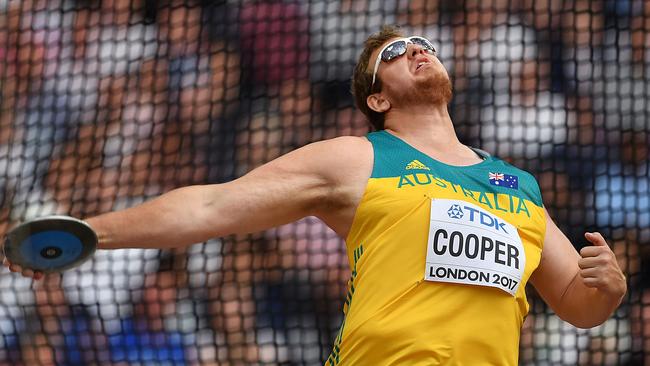 Australia's Mitchell Cooper competes in the qualifying round of the men's discus throw athletics event at the 2017 IAAF World Championships at the London Stadium in London on August 4, 2017. Picture: AFP PHOTO/Andrej ISAKOVIC